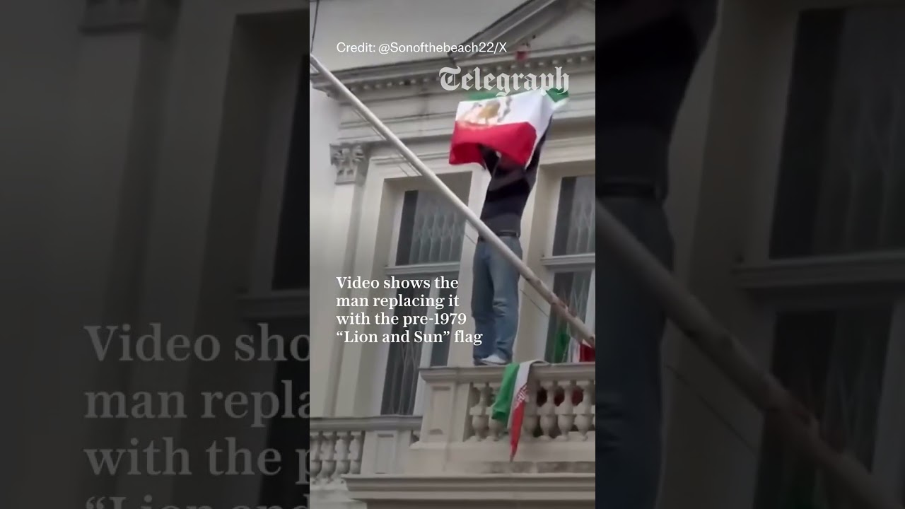 Protester tears down Iranian regime flag from London embassy