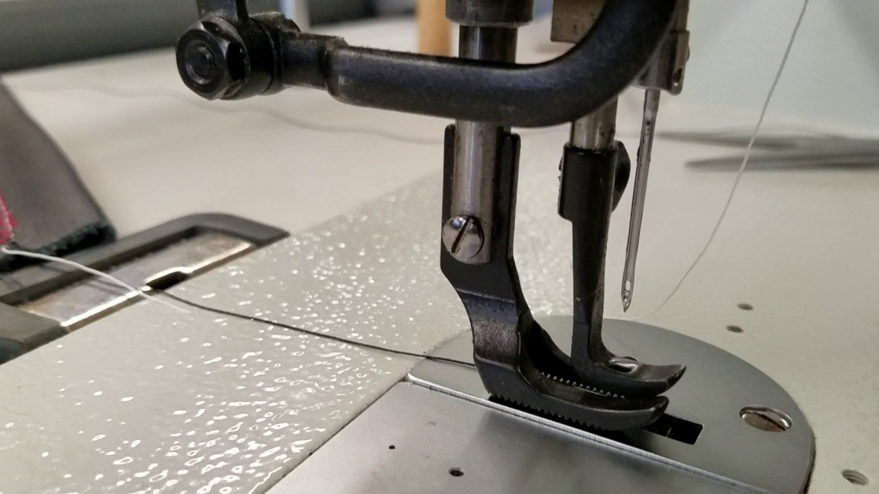 Feed difference between a Tacsew T111-155  and a Juki DU-1181N