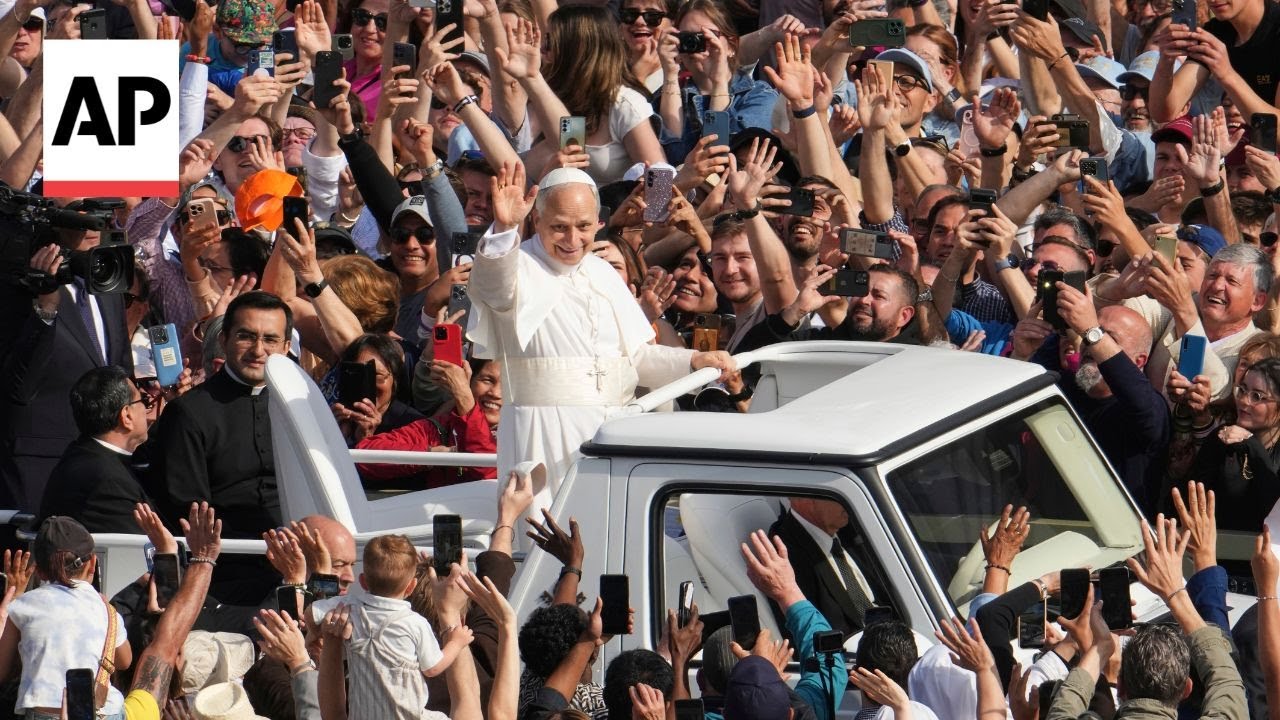Pope Leo XIV takes his first popemobile ride through St. Peter's Square