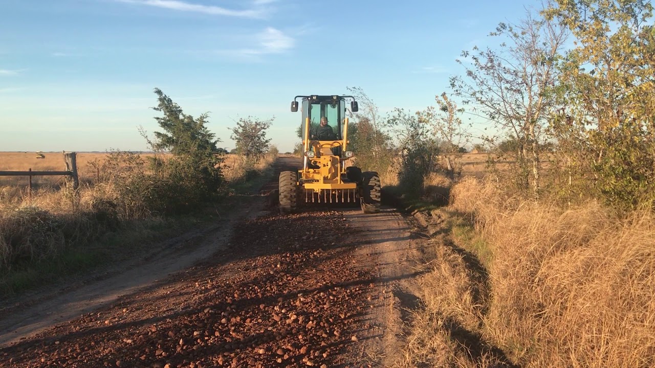 Re-grading/reshaping gravel road