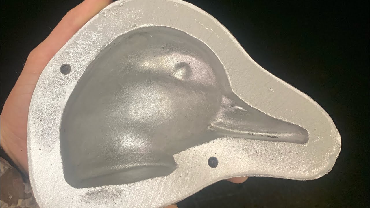 Making an aluminum duck decoy mold.