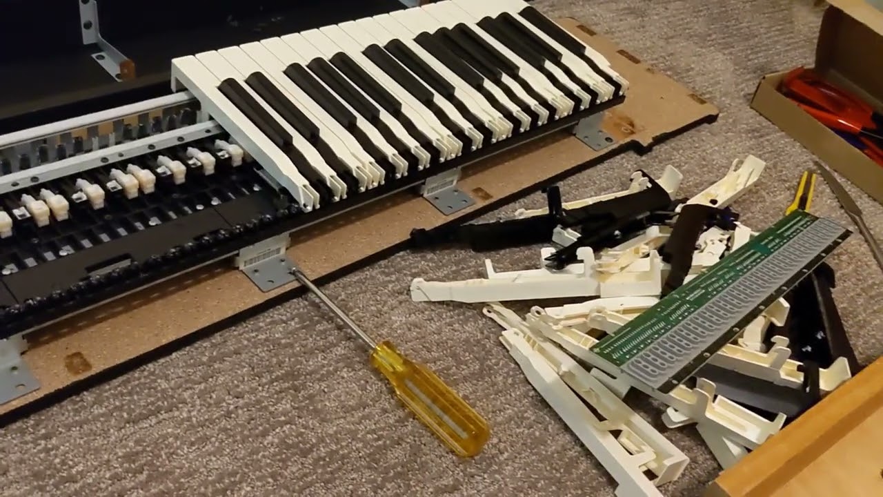 Roland RD-64 disassembly and surgery in order to make it shorter.  2023-07-22