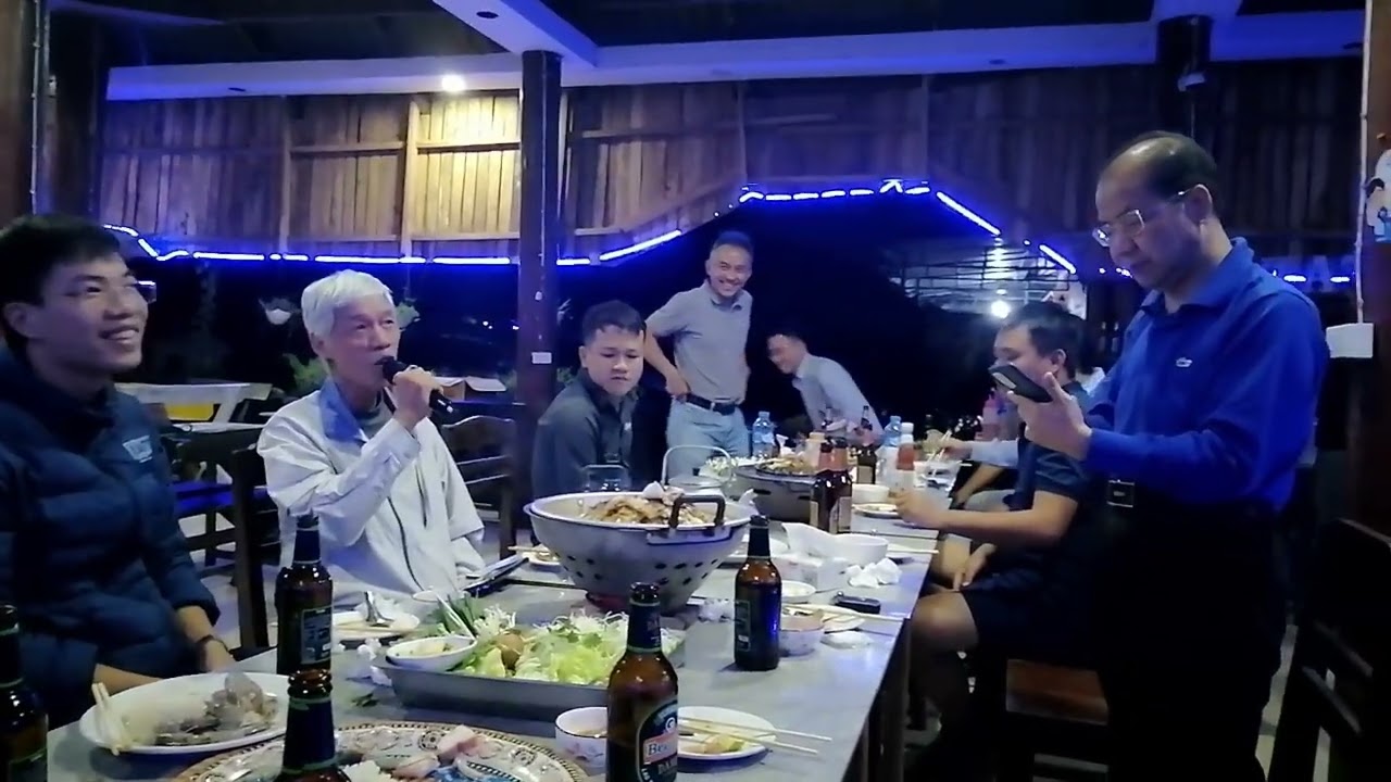 Vietnamese, Chinese and Thai engineers gather for dinner and sing together