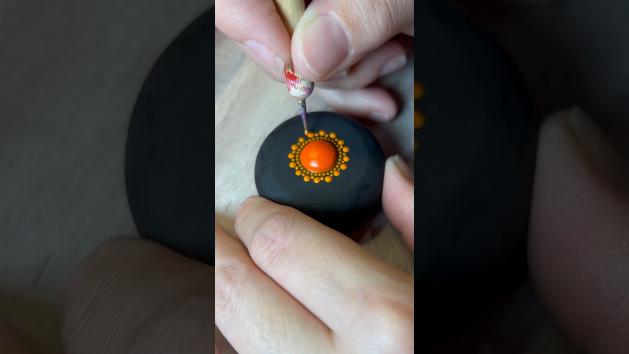 Beautiful ORANGE dot mandala stone! #dotpainting #mandalaart @SturnioloTriplets #art #dotart