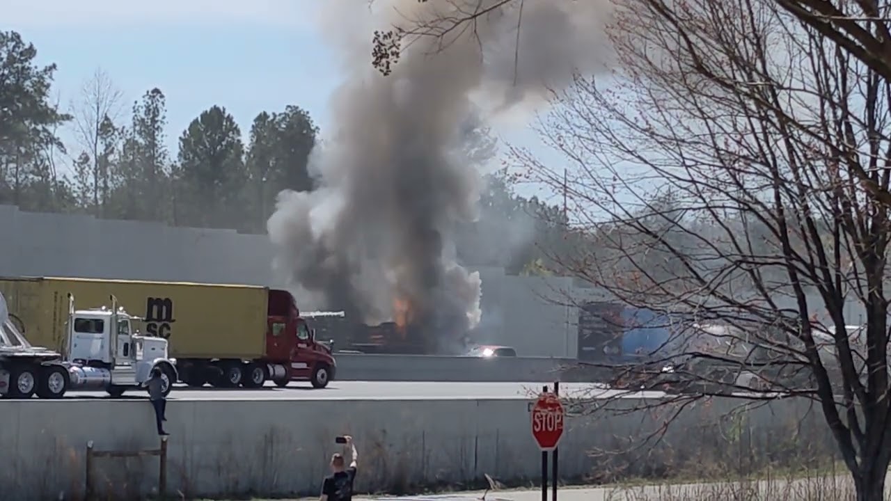 Car rear-ends a Semi, Catches Fire I-85 Suwanee Exit