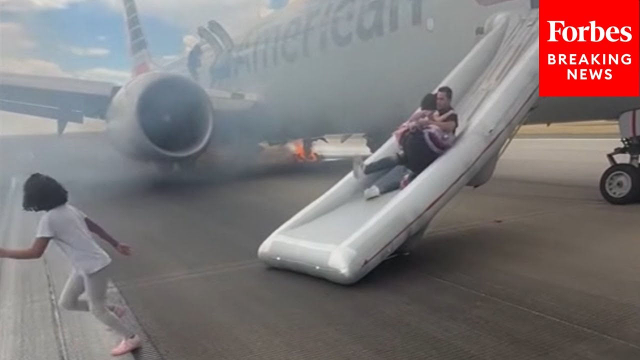 RAW VIDEO: Passengers Evacuate American Airlines Plane After Landing Gear Issue Causes Fire