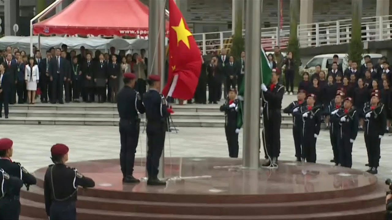 Flag raising ceremony for 20th anniversary of Macau handover to China | AFP