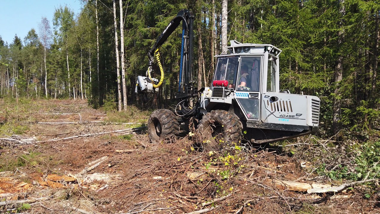 VIMEK 404SE CRDI and JOHN DEERE 1070E harvester