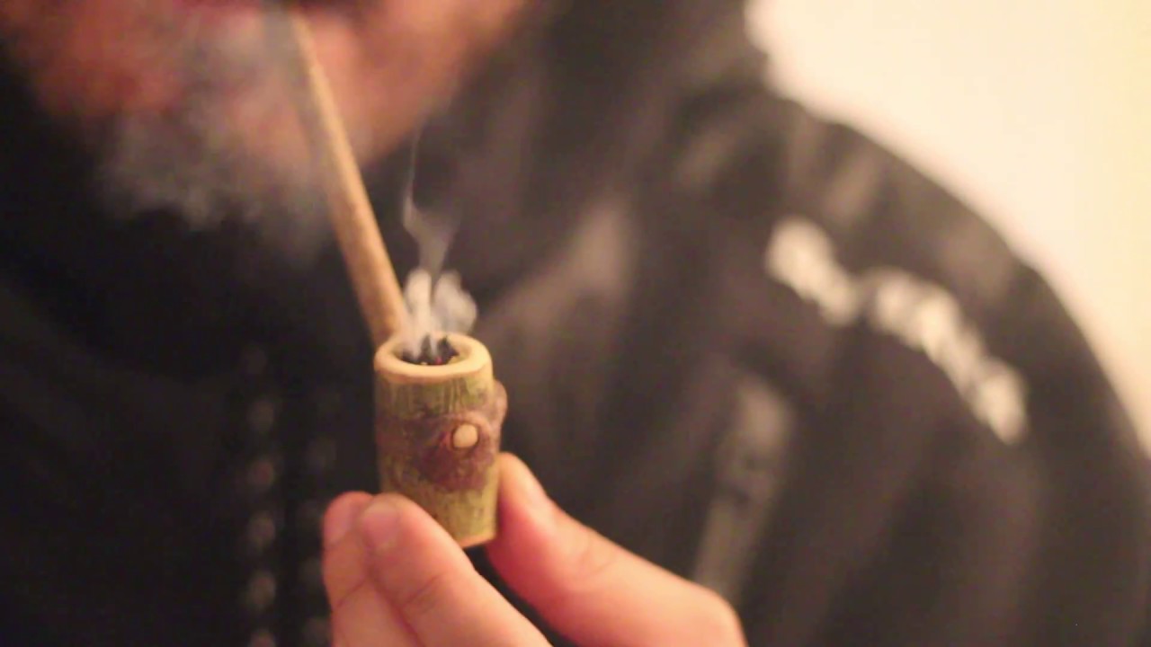 Smoking Out Of A Wooden Pipe and Taking Dabs