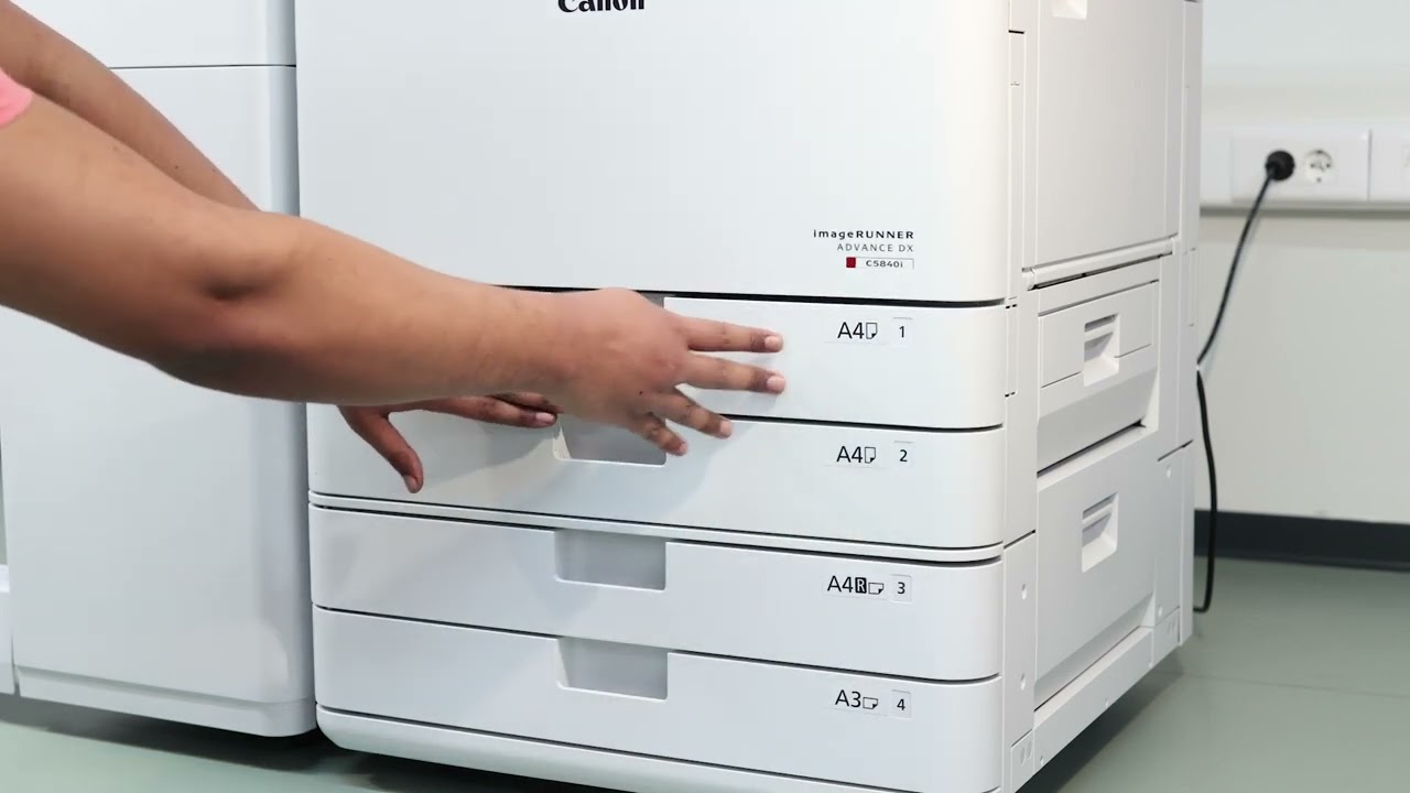How to remove jammed papers in the imageRUNNER ADVANCE DX printer