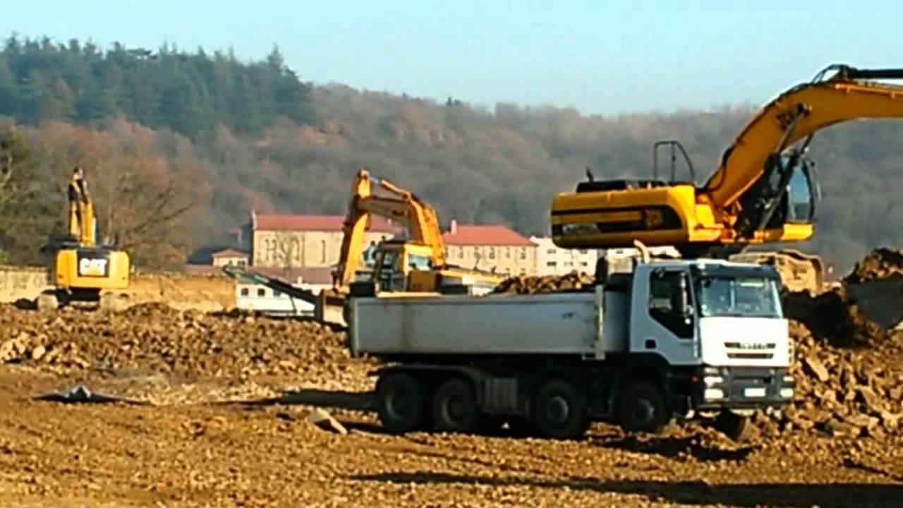 john deere 7920 + benne tp   sur un chantier
