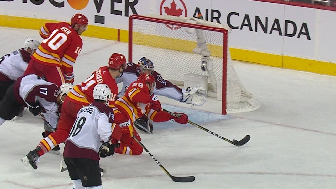 Andrew Mangiapane scores beauty from one knee
