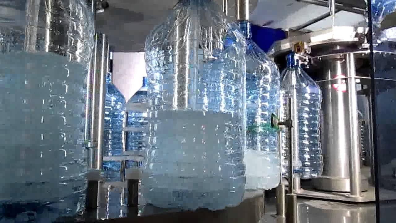 5 GL P.E.T BOTTLE FILLING ROTARY MONOBLOCK 4IN1