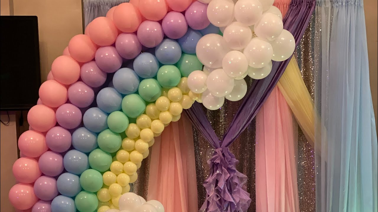 Rainbow Balloon Arch by Liz Poppin Balloons