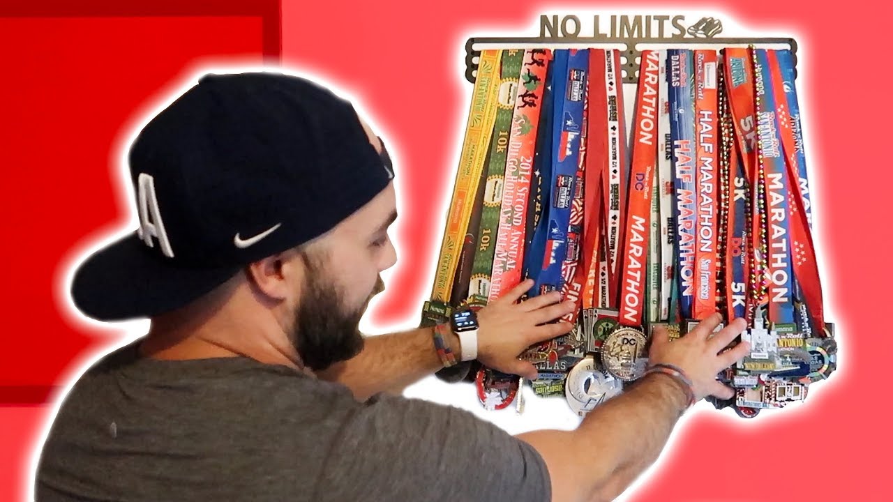HUNDREDS OF MARATHON MEDALS DISPLAYED ON THE WALL!  **26.2 out of control**