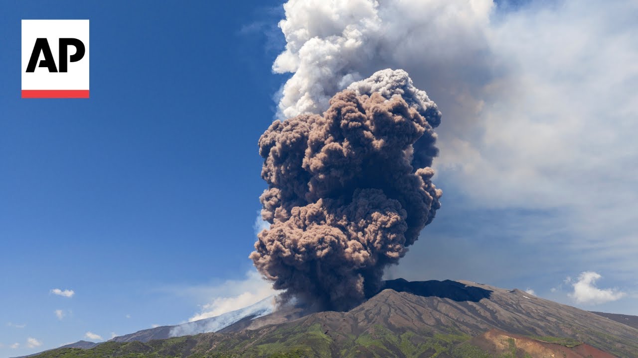 Mount Etna erupts in fiery show of smoke and ash in Sicily, Italy
