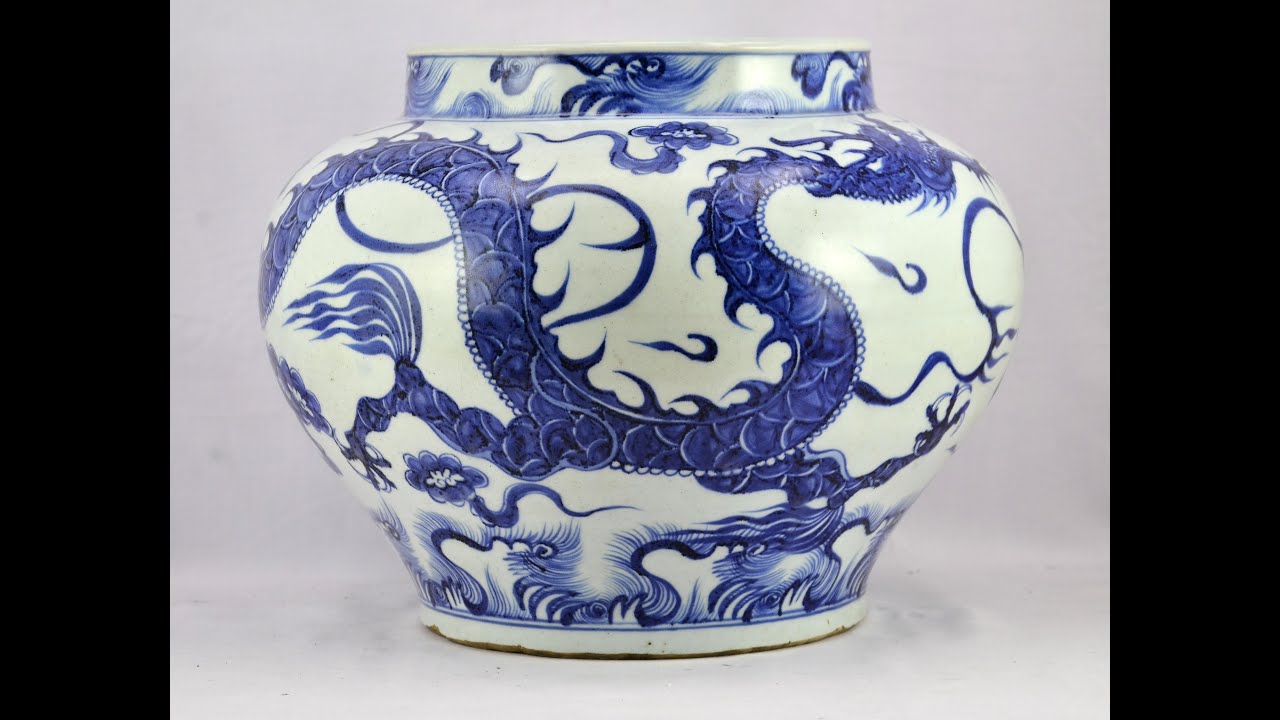 Jar with dragon and wave design in underglaze blue  Yuan Dynasty