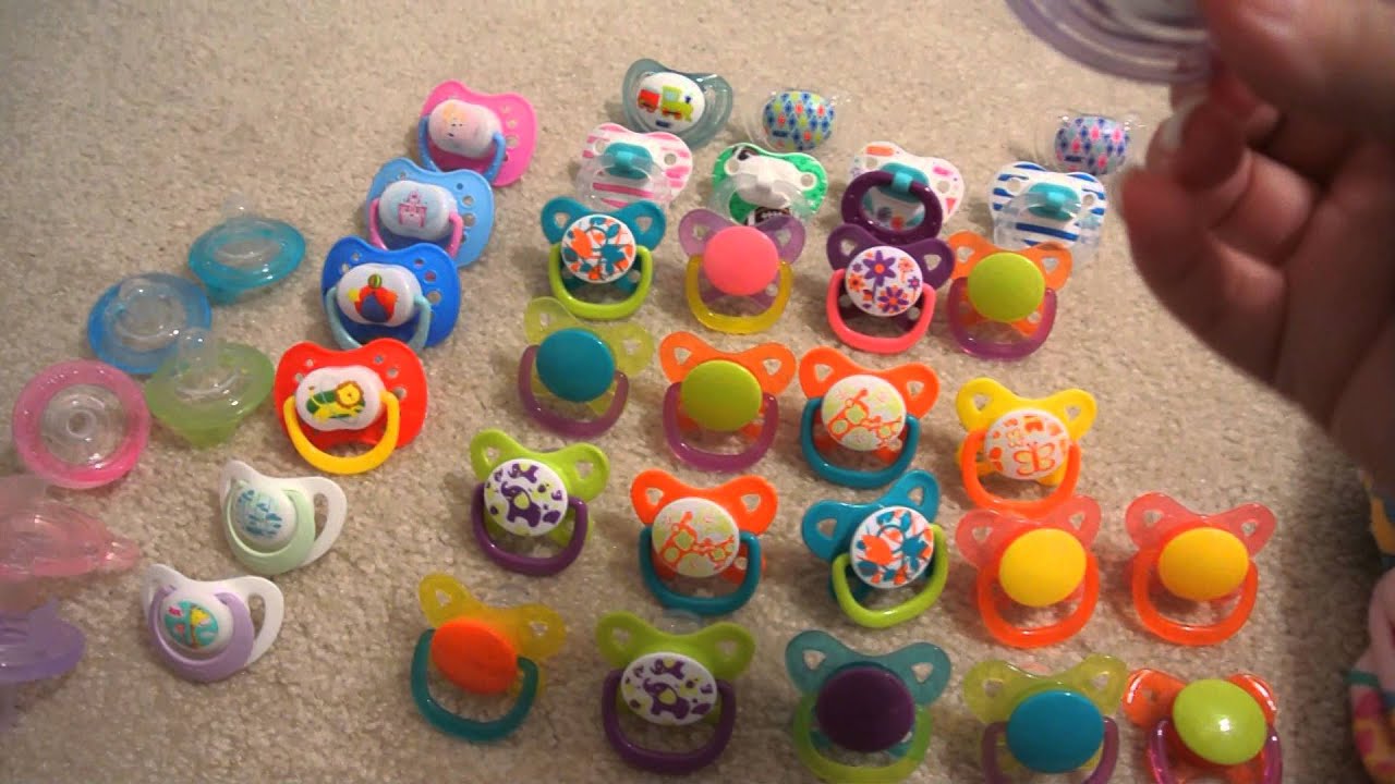 some of our new paci's and diapers :D