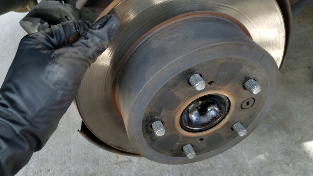 2009 Toyota camry como cambiar un cojinete o balero trasero.