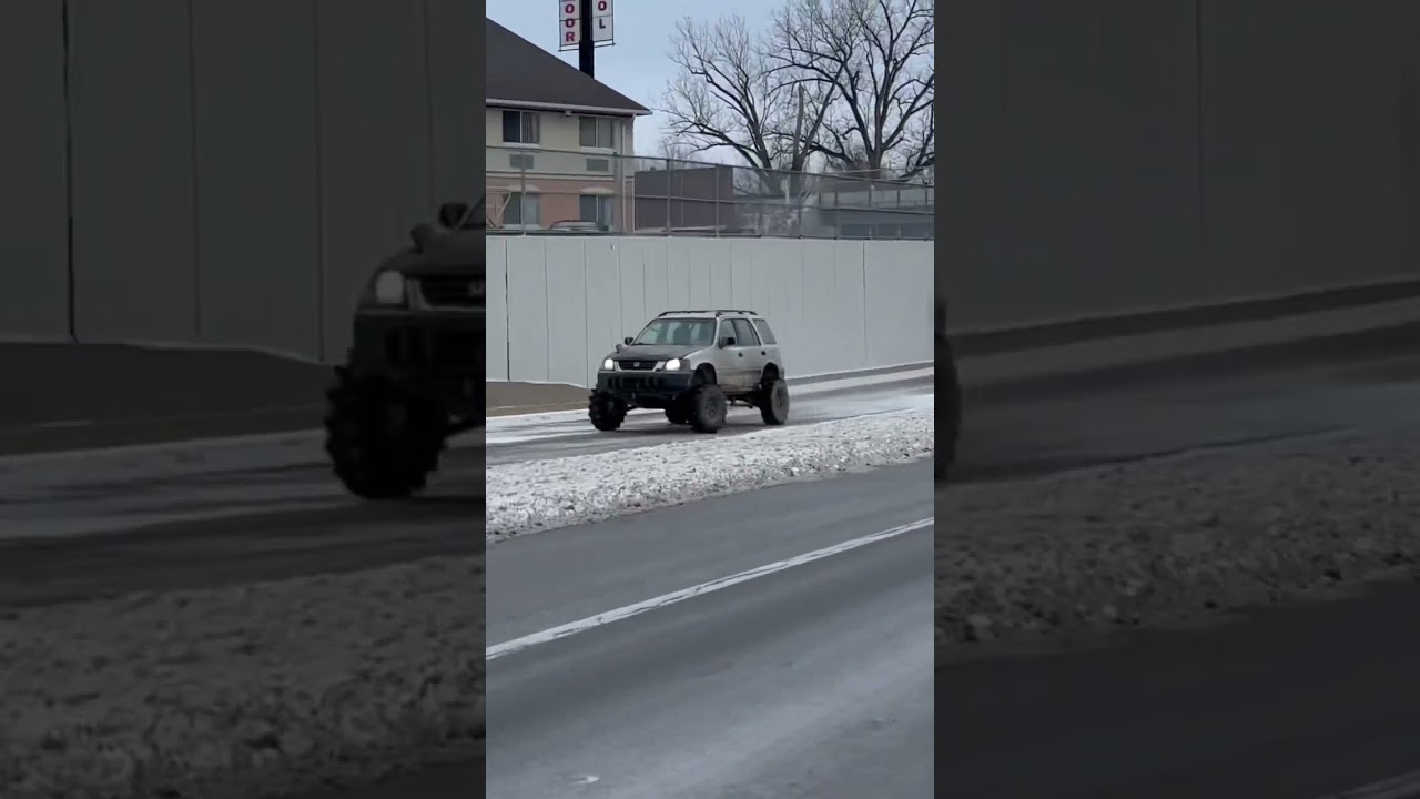 Absolute menace to society. Honda CR-V lifted on 33&rdquo; tractor tires