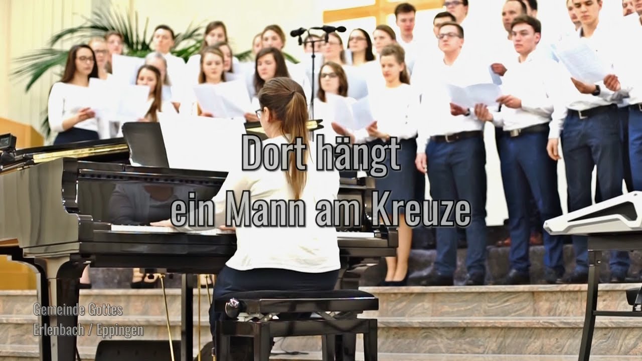 Dort hängt ein Mann am Kreuze