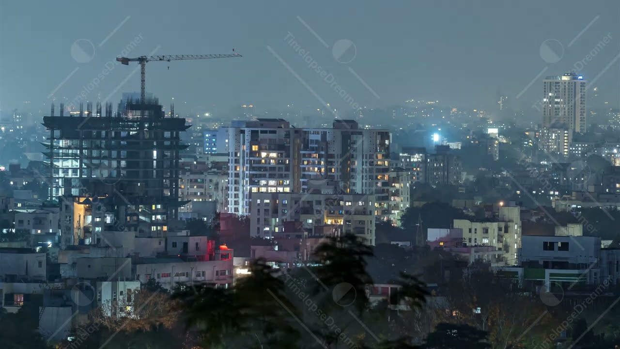 Day to Night Time lapse of City Skyline captured from a Hill, City of Pune, Maharashtra, India