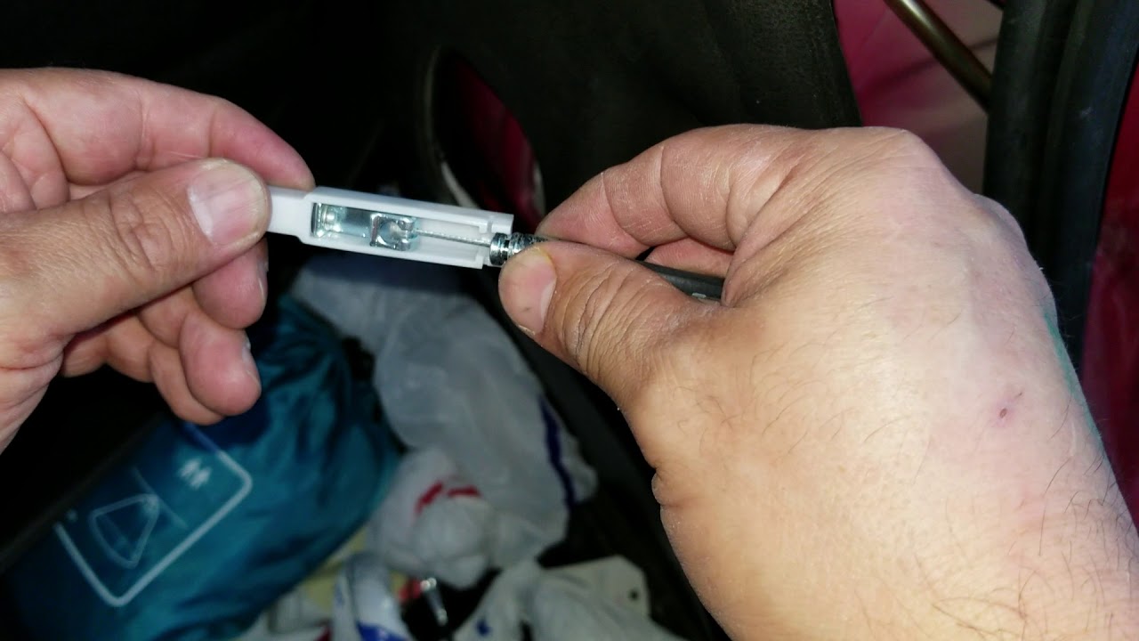 Nissan cube gas door latch replacement part. 3