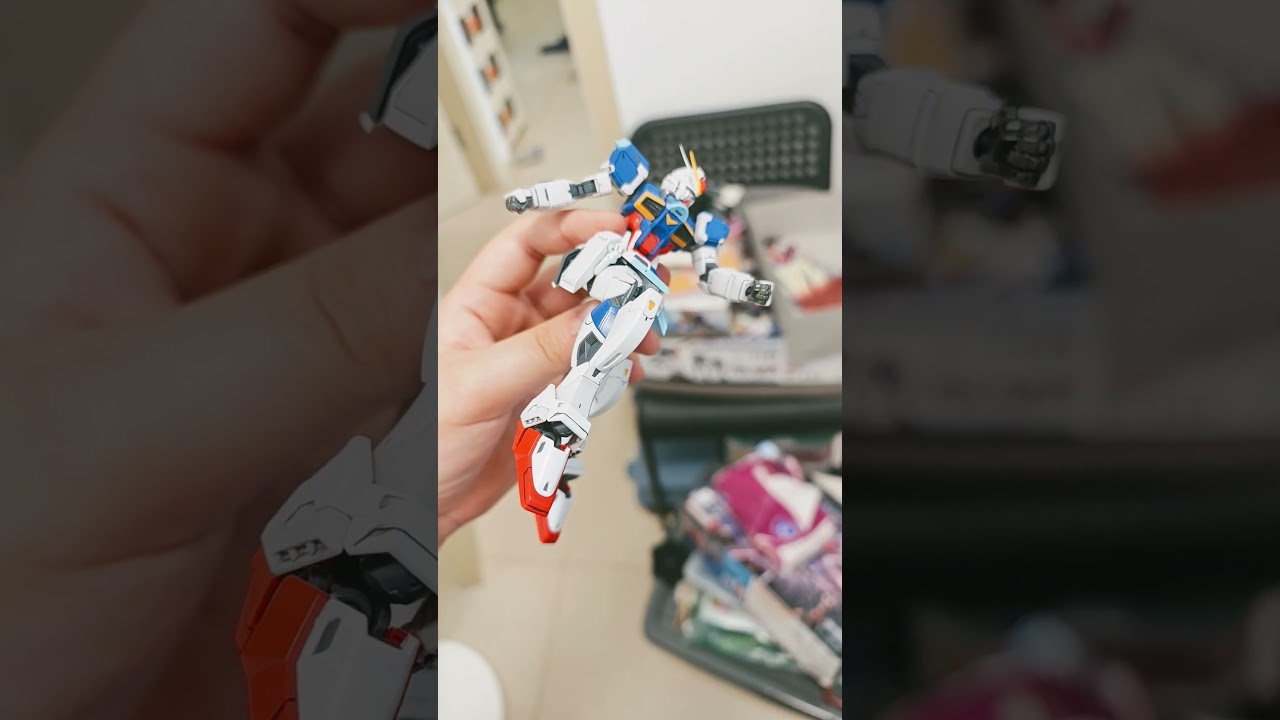RG strike gundam, impluse, HG infinite justice gundam type ii and GQUUUUUUUUUUX gundam poses