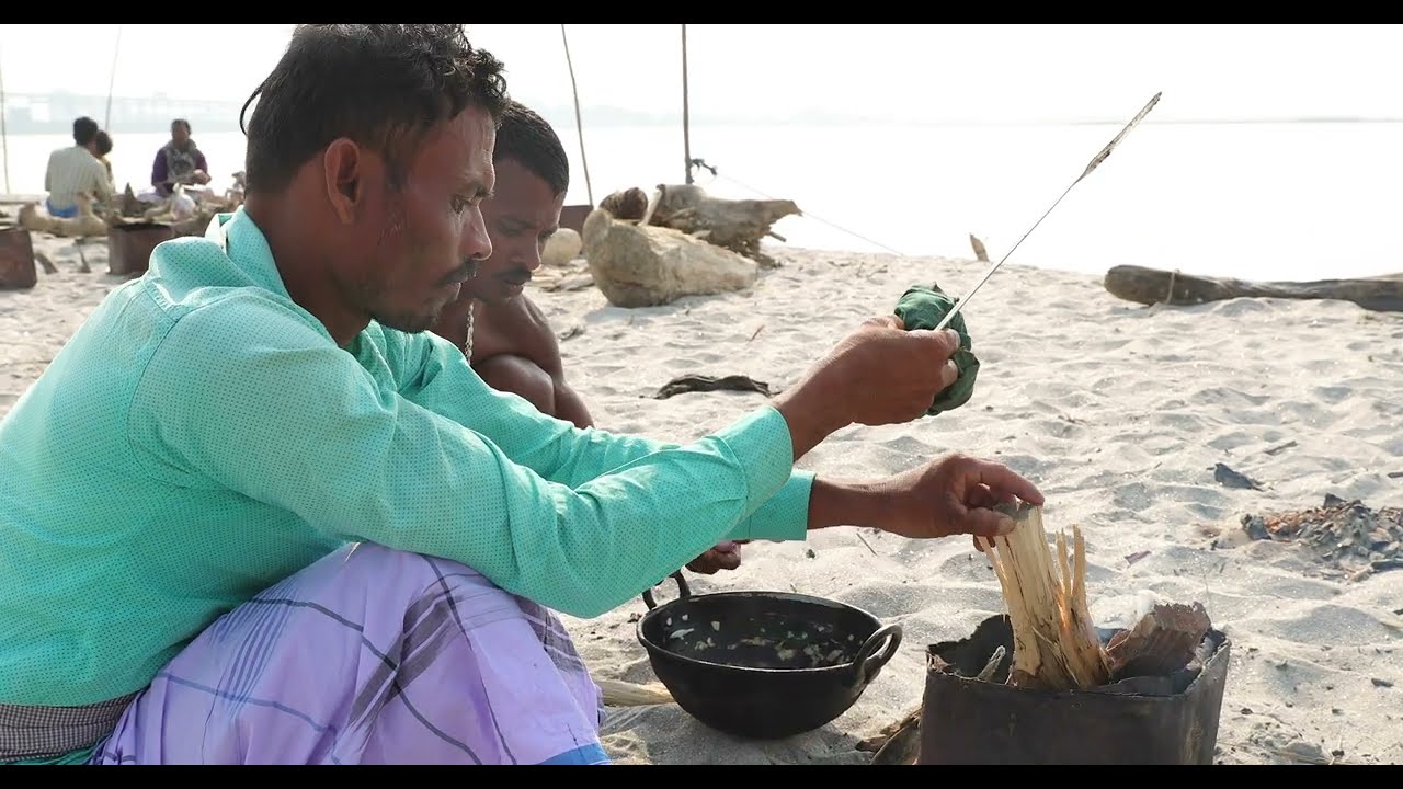 Freshwater fish curry prepared by Fisherman in Terai region of Nepal 4K.