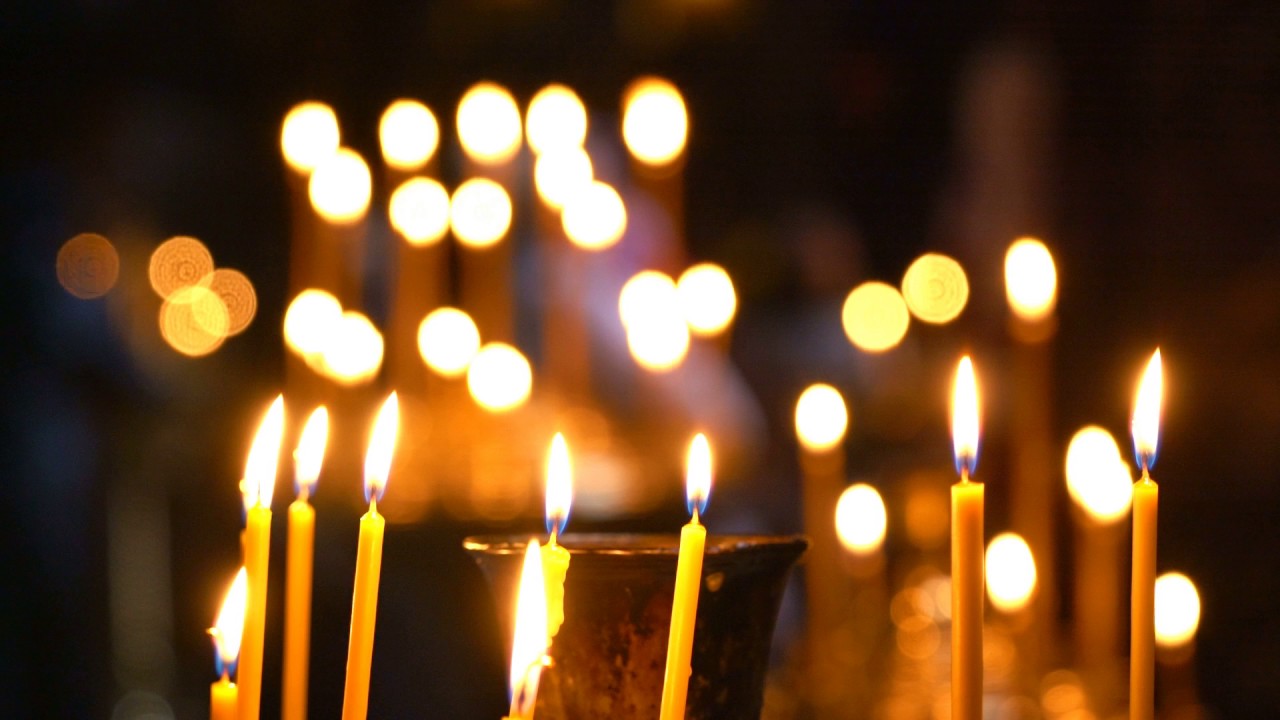 Inside the Orthodox Church Candles Are Burning People Come to Light a Candle