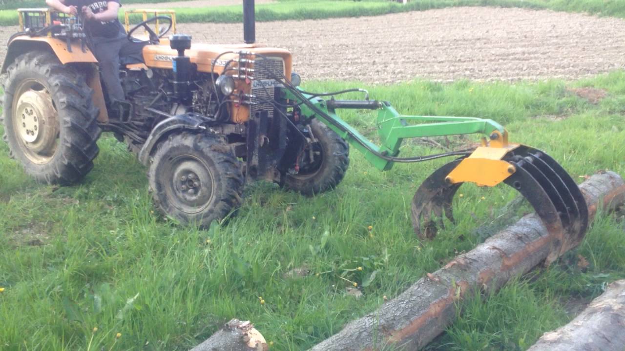 Ursus C330 4x4 załadunek drzewa