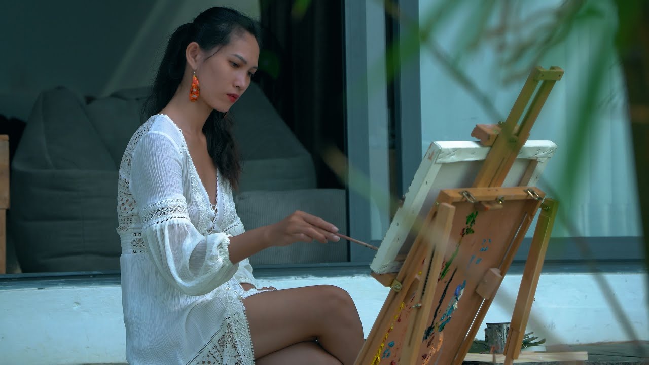 Oil Painting by the Ocean Cats, Birdsongs, and Tranquility
