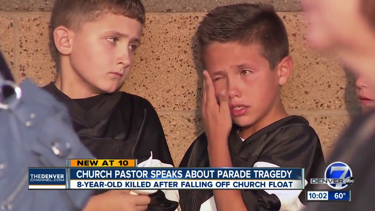 Vigil held for boy, 8, killed by parade float in Windsor; funeral services set for Friday