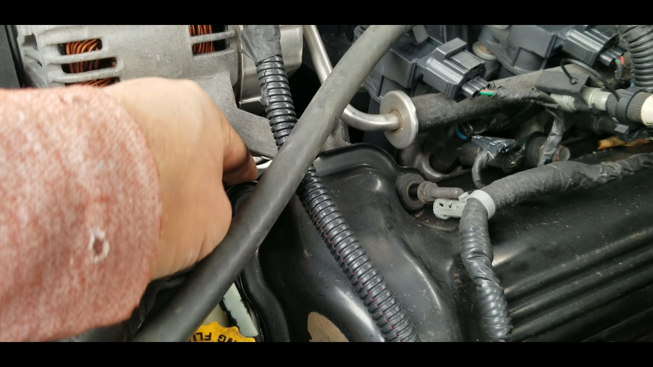 Cambio de empaques de tapa de las valvulas de un Jeep liberty 2004. 1era parte