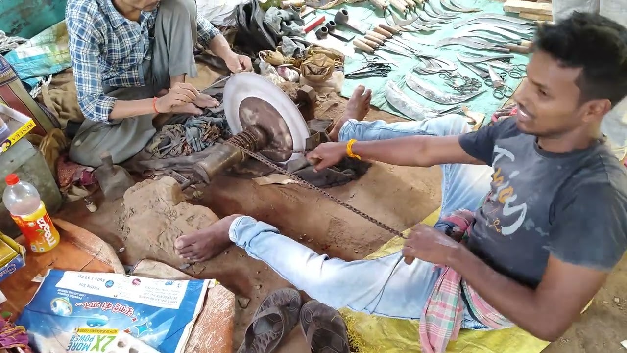 Tapas sharping his Scissor with the man who does all this...