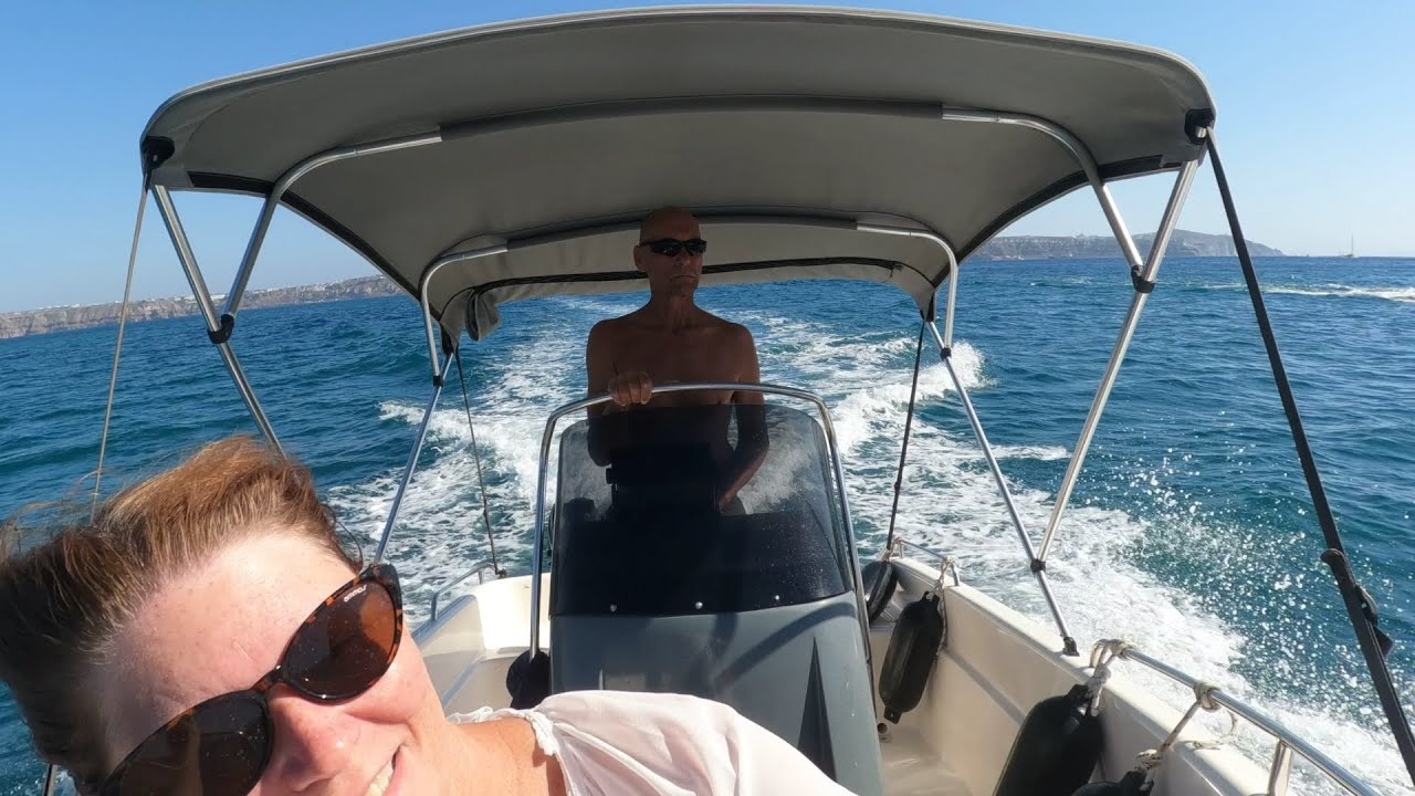 Santorini, rent your own Private small Motor Boat , no special license.