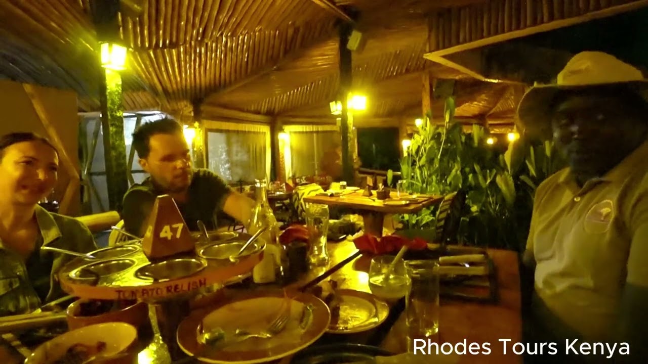 Romanians in Nairobi Kenya Discover Hidden Gem at Carnivore Restaurant with Rhodes Tours!