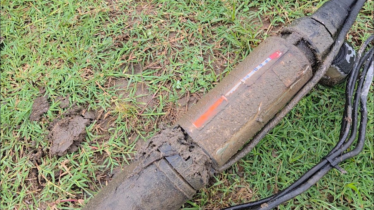 The wastewater technicians repairing a clogged aerobic septic system