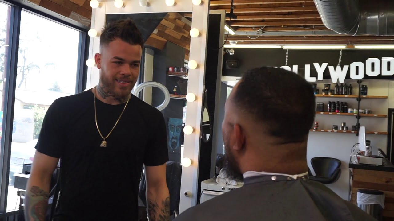 GETTING A HAIRCUT BY WESTER BARBER