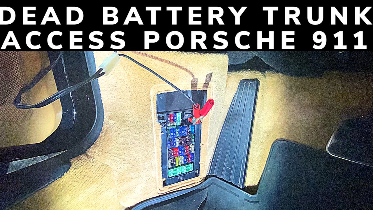 Open trunk on a Porsche with a dead battery.