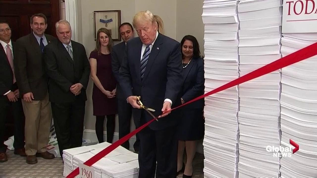 In bizarre ribbon cutting ceremony, Trump promises to reduce regulations