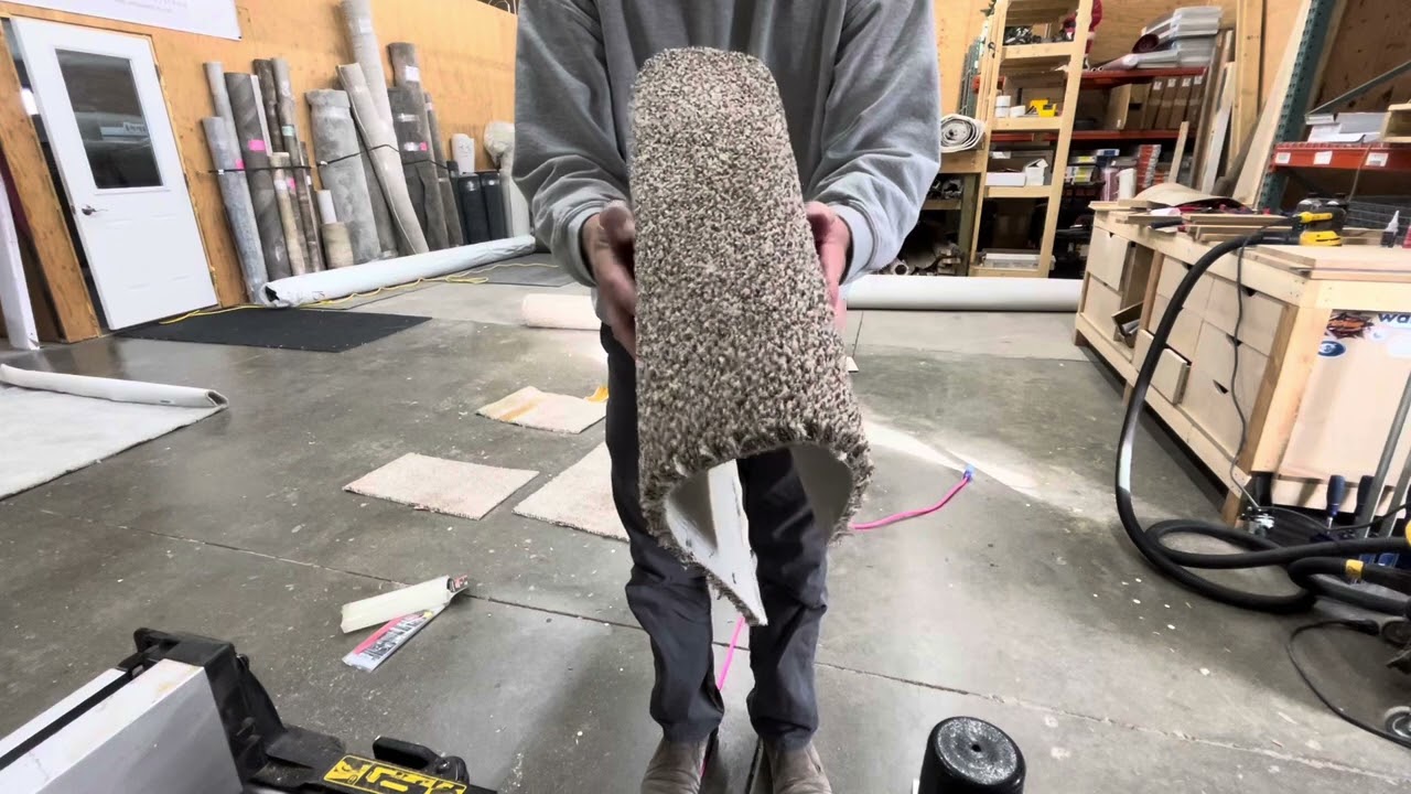 Seam sealing carpet with hot glue