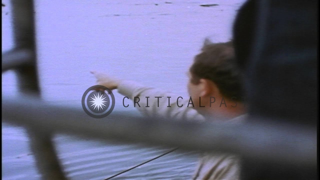 Japanese prisoners being taken aboard USS Skate underway in the Pacific Ocean. HD Stock Footage