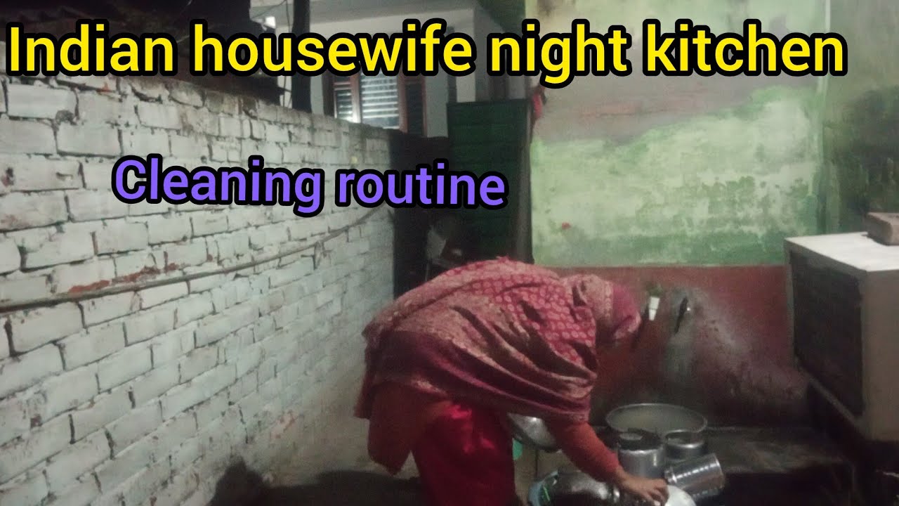 Indian middle housewife night kitchen cleaning