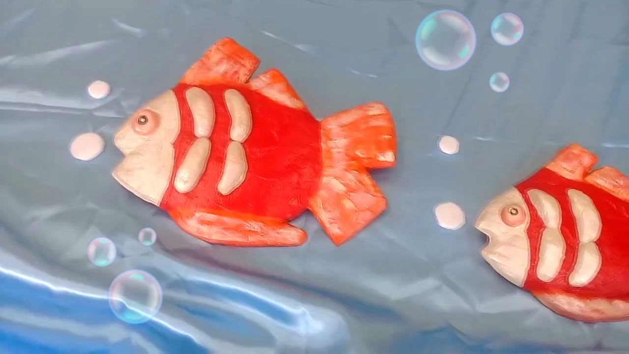 DECORAÇÃO DE  PAREDE - PEIXE DE CIMENTO