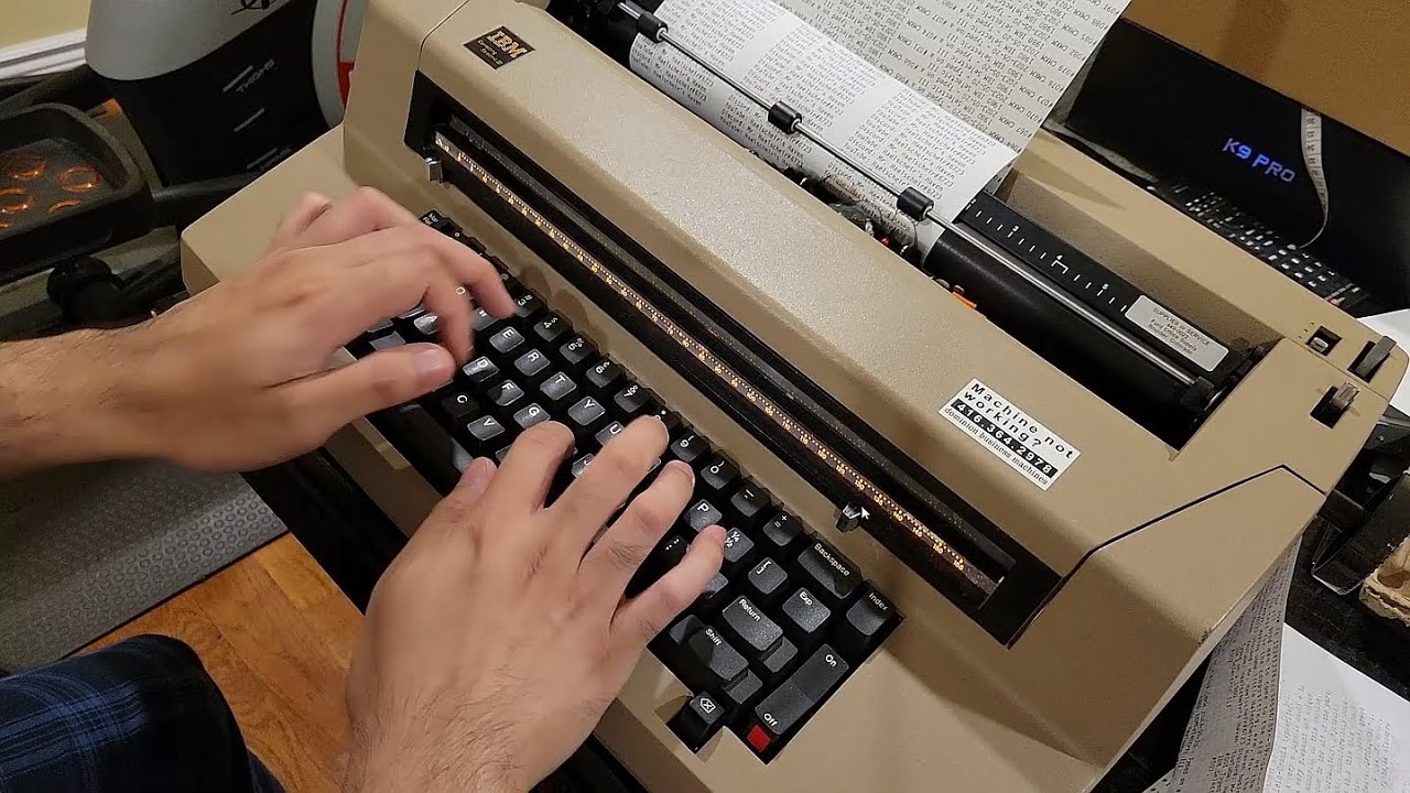 Typing business cards on a 1980 IBM Selectric III typewriter