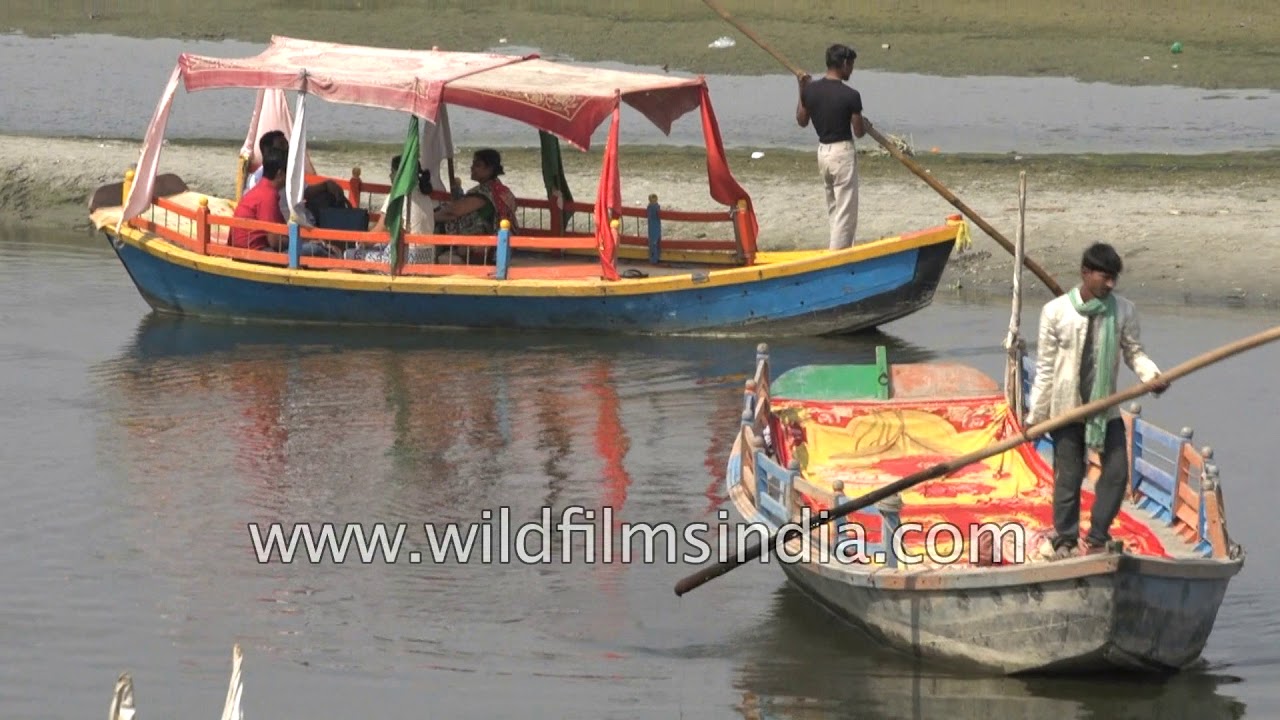 Indian people take boat ride at Kesi Ghat in Vrindavan, Uttar Pradesh