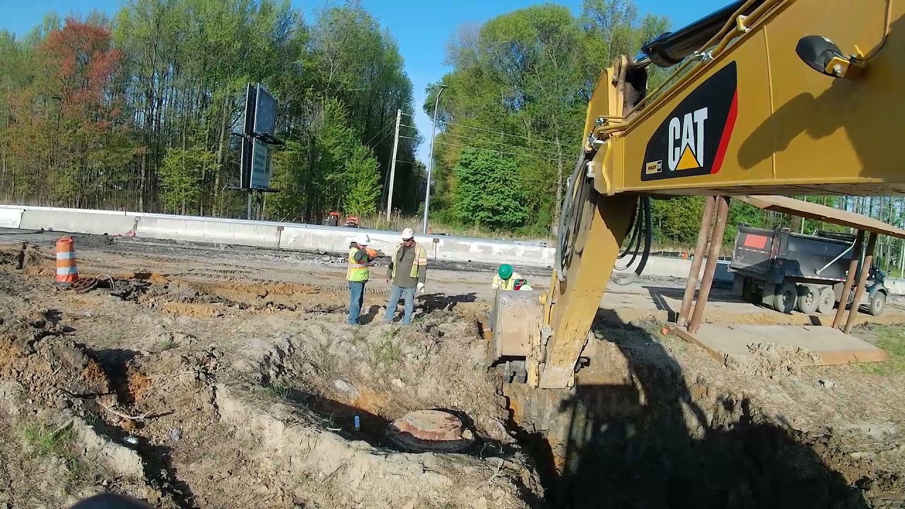 Digging 16ft Deep Existing Sewer Interceptor, HEAVY HIGHWAY 335 Cat Excavator