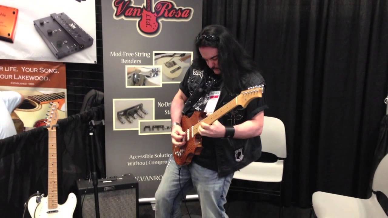 Tommy Bolan (Richie Ramone Band) tests out the Stay Tuned Tremolo Claw at Summer NAMM 2013