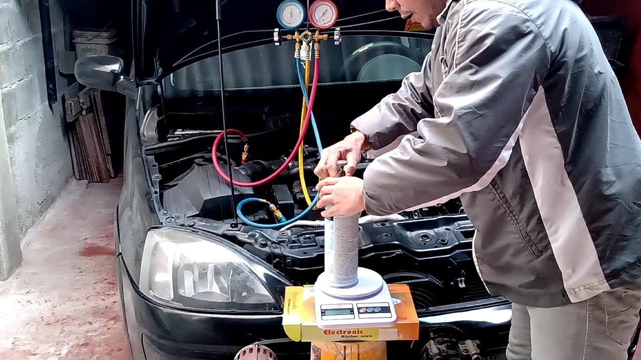 Vácuo e carga de gás r134a no ar condicionado do Corsa